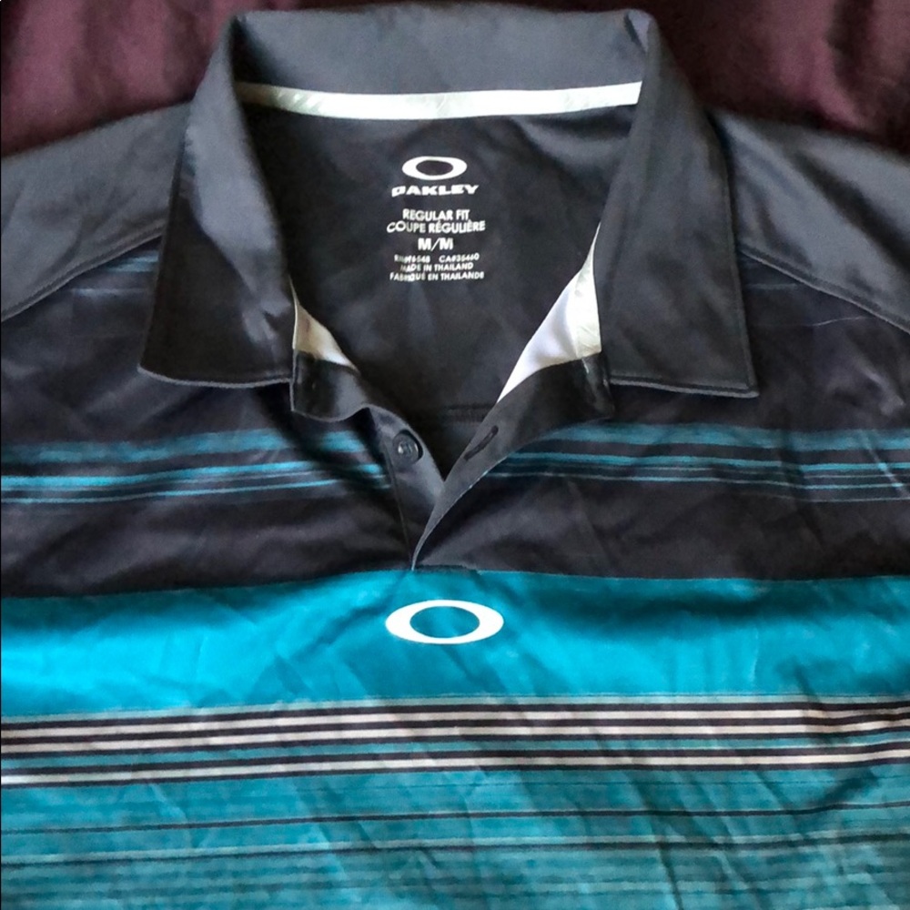 Oakley blue polo shirt